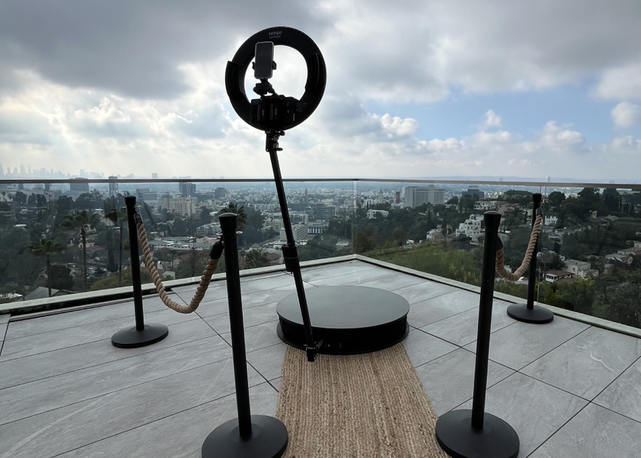 Our 360 Photo Booth Rental set up on a rooftop, offering a panoramic view for an immersive experience.
