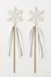 two snowflakes on sticks with  white ribbons