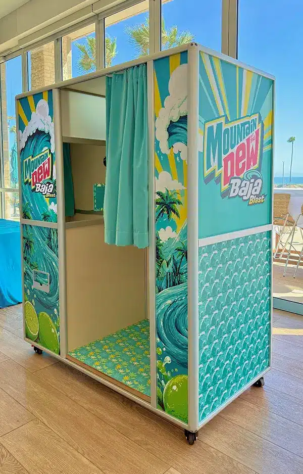 a customized enclosed photo booth brand activation for Mountain Dew