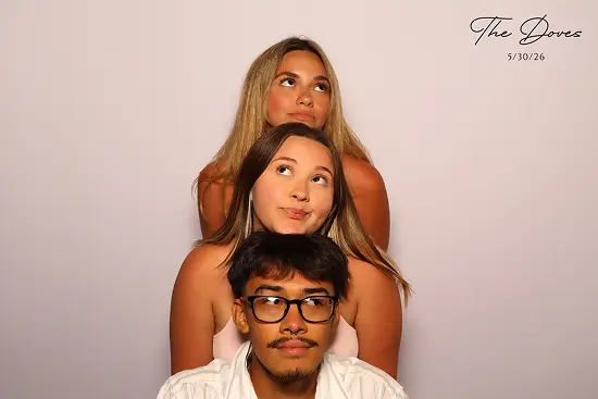 Three friends stack their heads and look in different directions