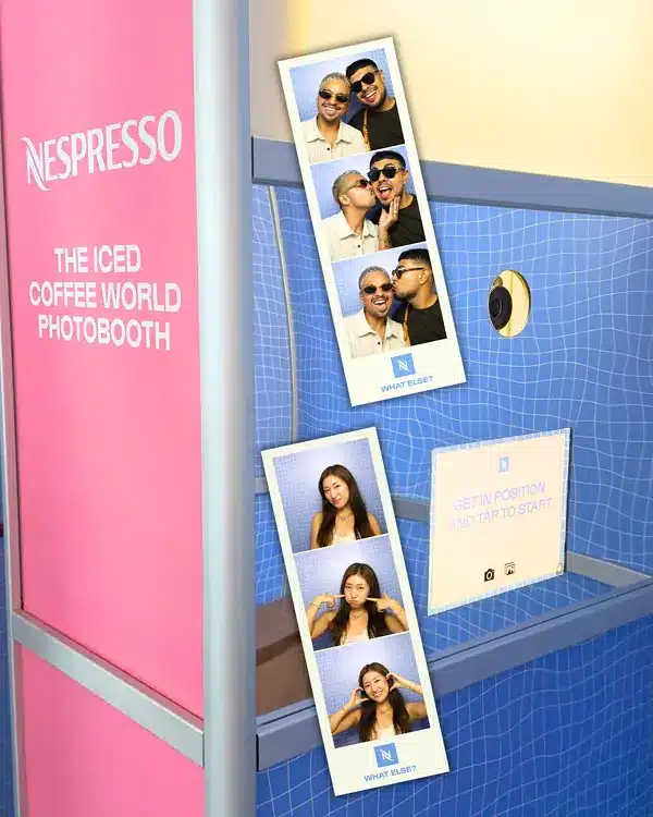 Nespresso branded Enclosed Vintage Booth with custom blue panels and printed photo strips.
